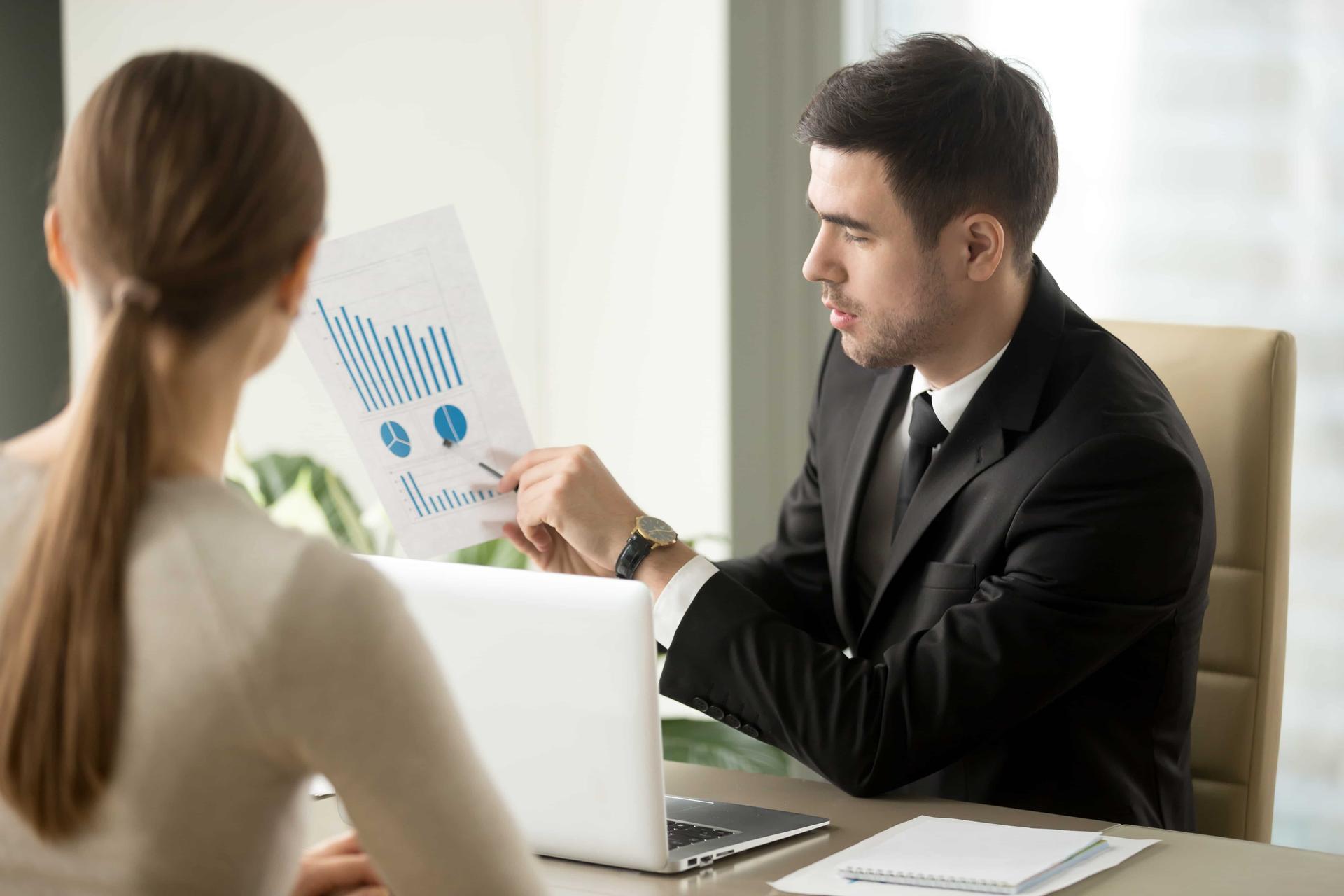boss-talking-about-company-financial-perspectives-min