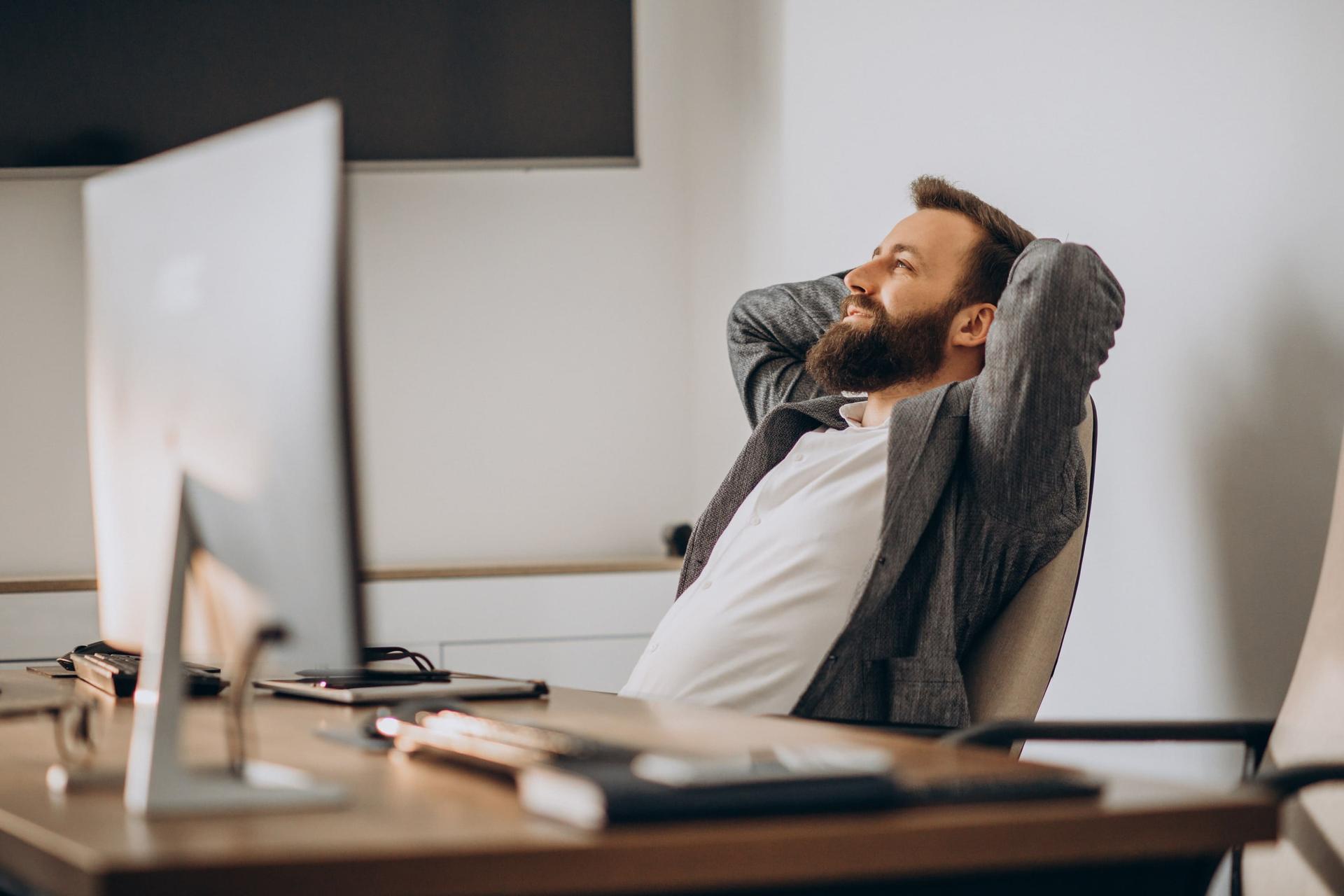 handsome-business-man-working-at-the-desk-min-min